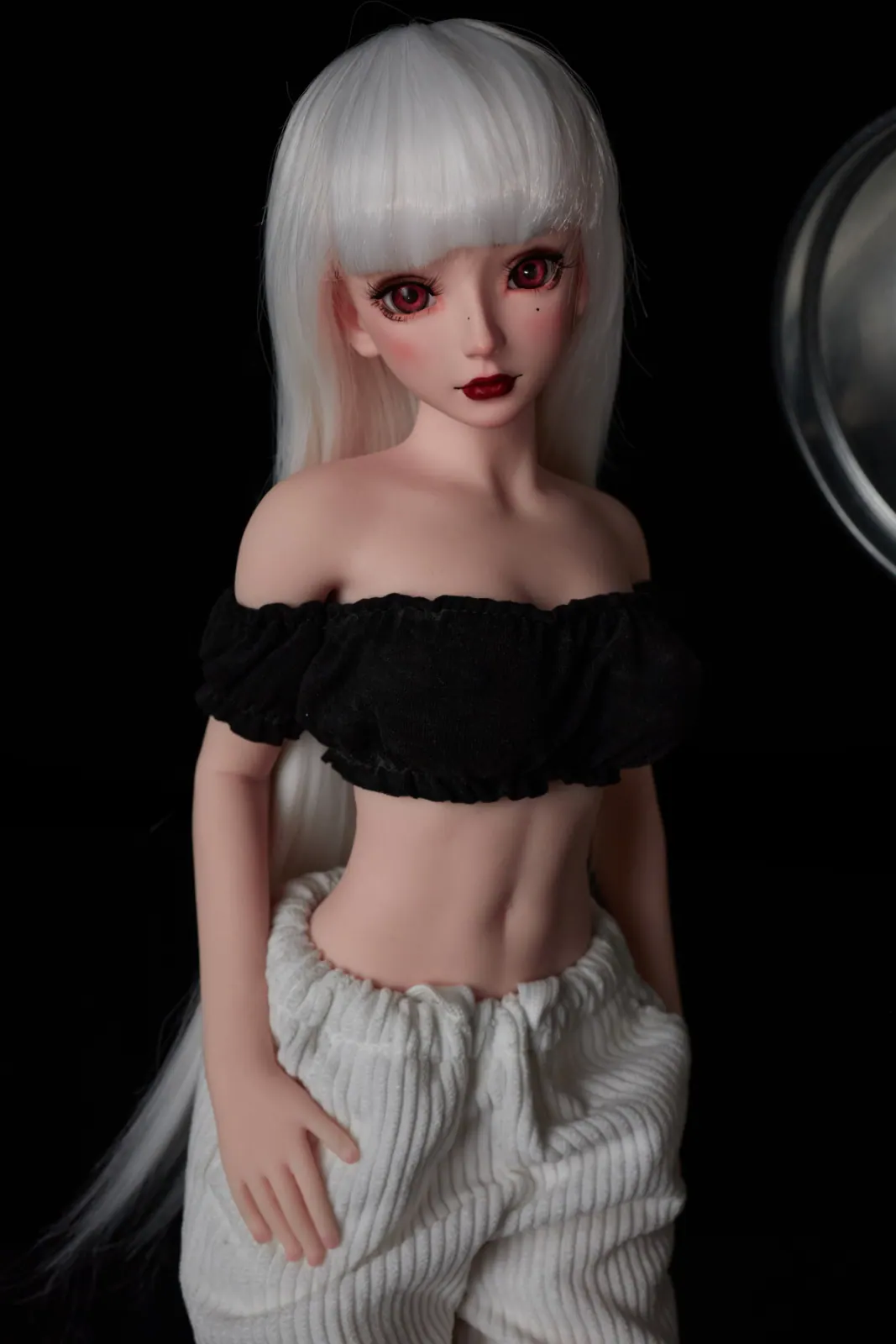 J60 Saki boneca Canela – vista 5